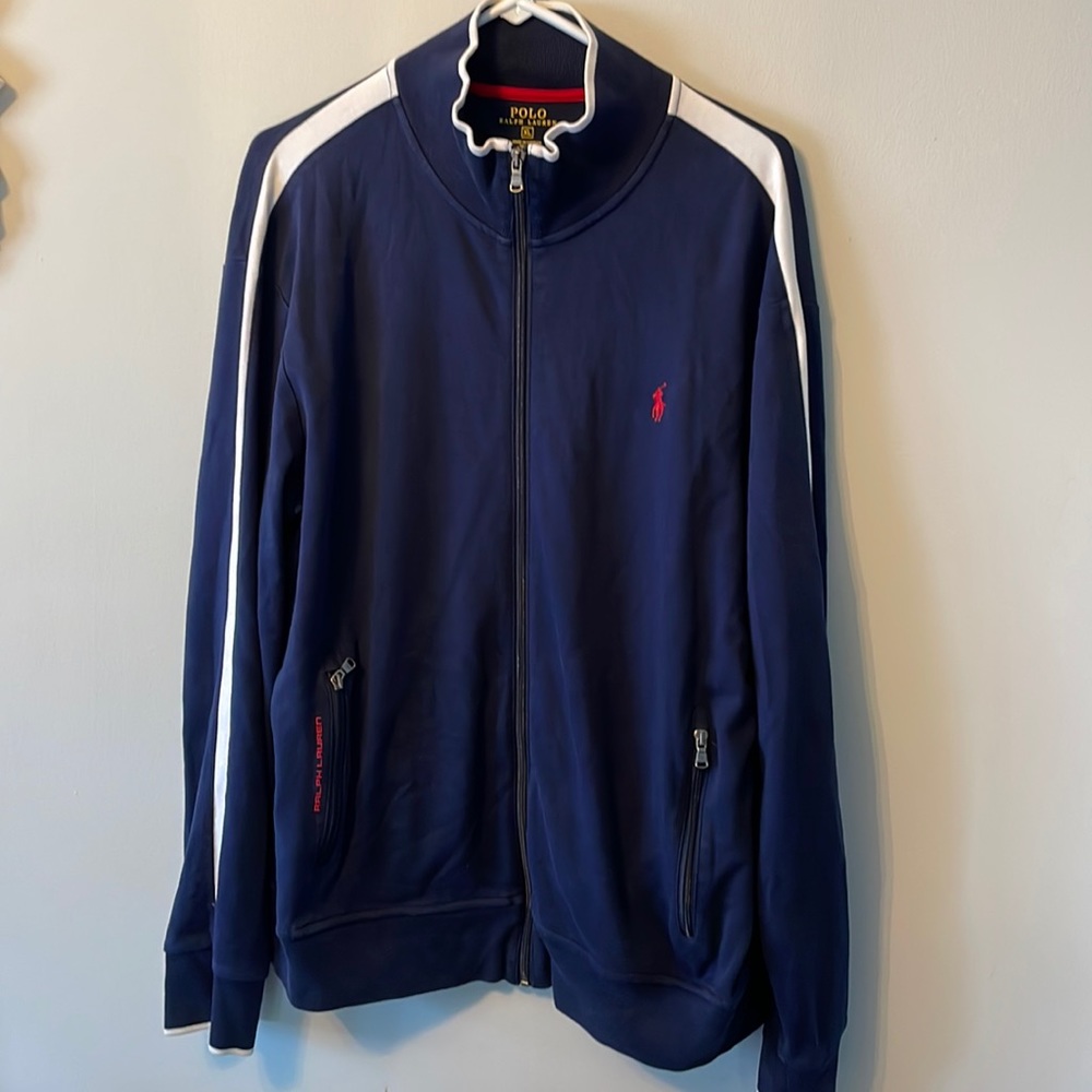 Blue with white stripes down the sleeves. Polo by Ralph Lauren.XL. 100% cotton.
